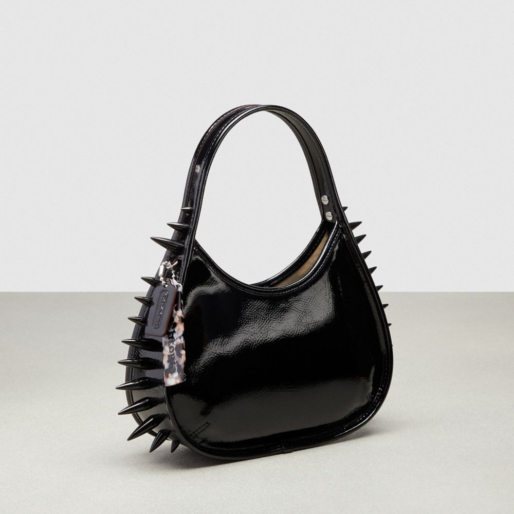 COACH®,Ergo Bag in Crinkle Patent Coachtopia Leather: Spikes All Over,Small,Black,Angle View