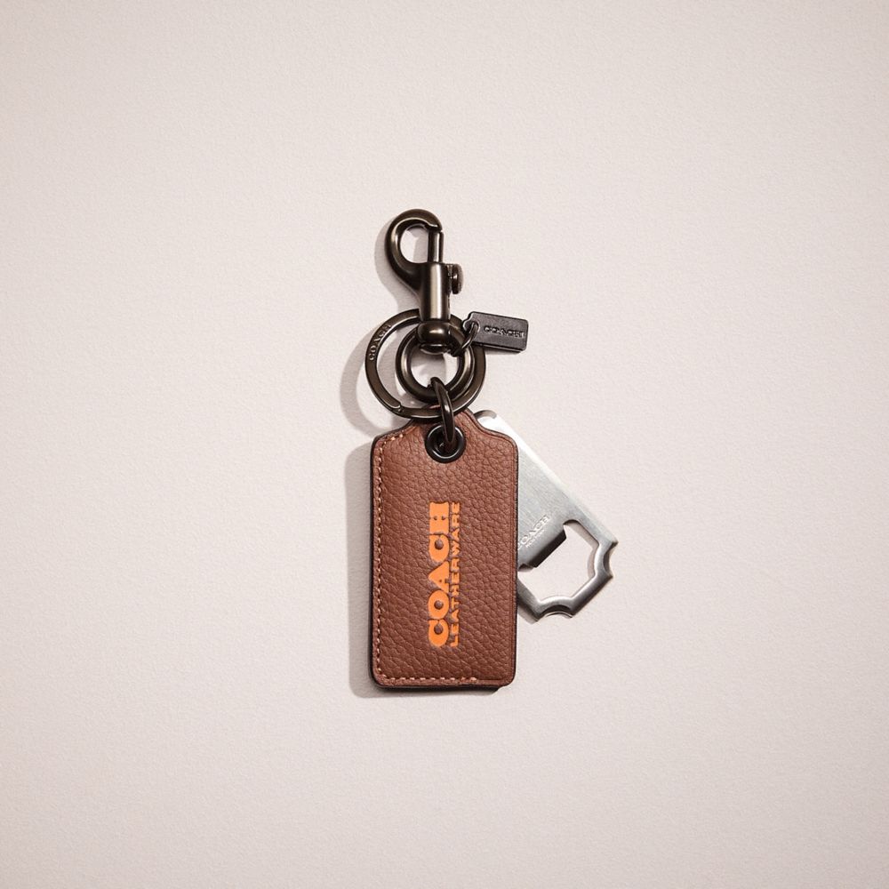 COACH®,RESTORED BOTTLE OPENER KEY FOB,Dark Saddle/Canyon,Front View