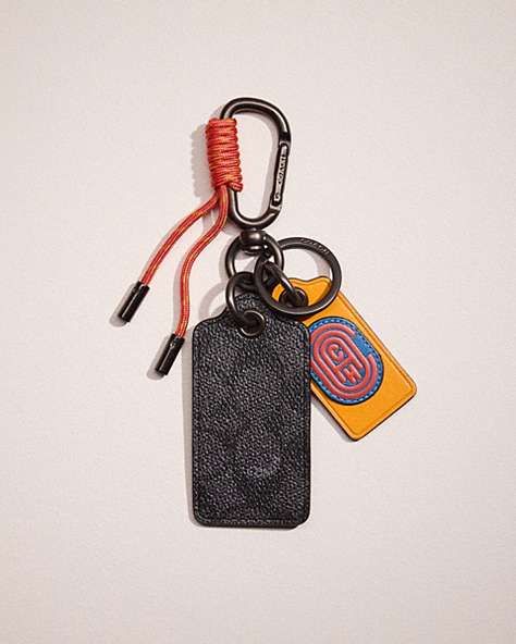 COACH®,RESTORED KEY FOB IN SIGNATURE CANVAS WITH COACH PATCH,Charcoal Signature Multi,Front View
