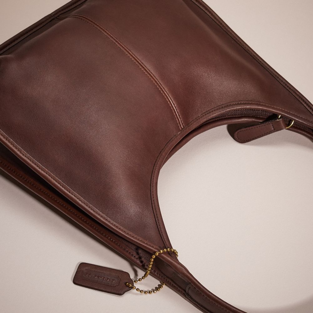 COACH®,Vintage Ergo Zip Bag,,Closer View