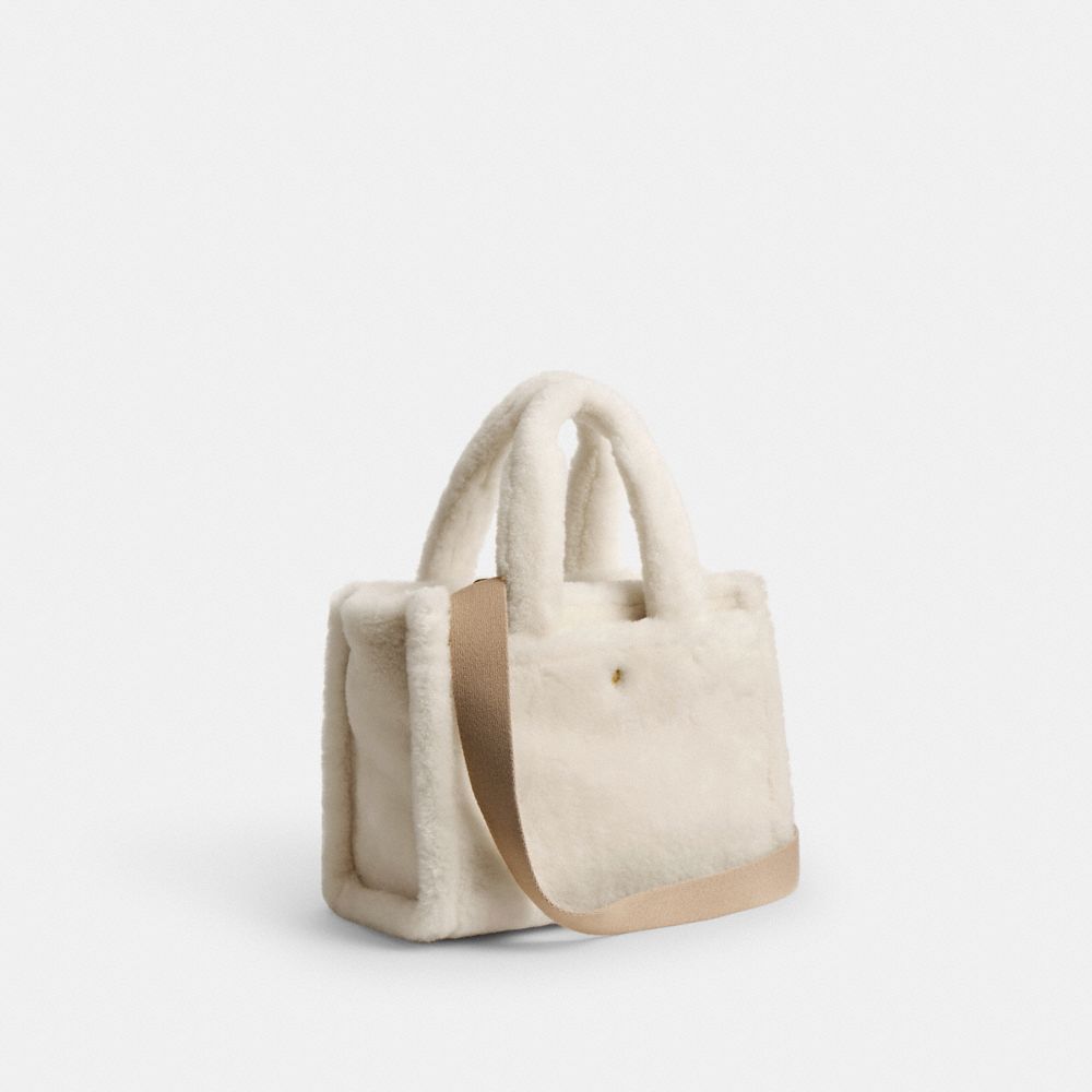 COACH®,Cargo Tote Bag 26,Shearling,Crossbody,Logo,Embossed,Compact,Brass,Casual,Cream,Angle View