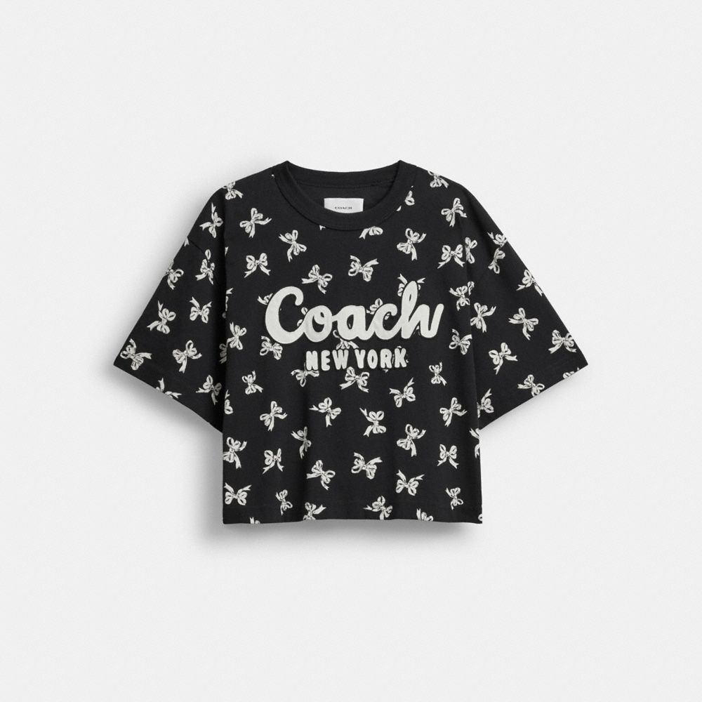 Coach Cropped-t-shirt Mit Kursiver Signature Und Schleifen-print In Black