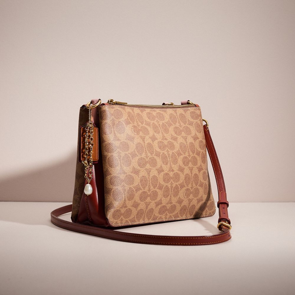 COACH®,UPCRAFTED DOUBLE ZIP SHOULDER BAG IN SIGNATURE CANVAS,Sweet Nostalgia,Brass/Tan Rust,Angle View