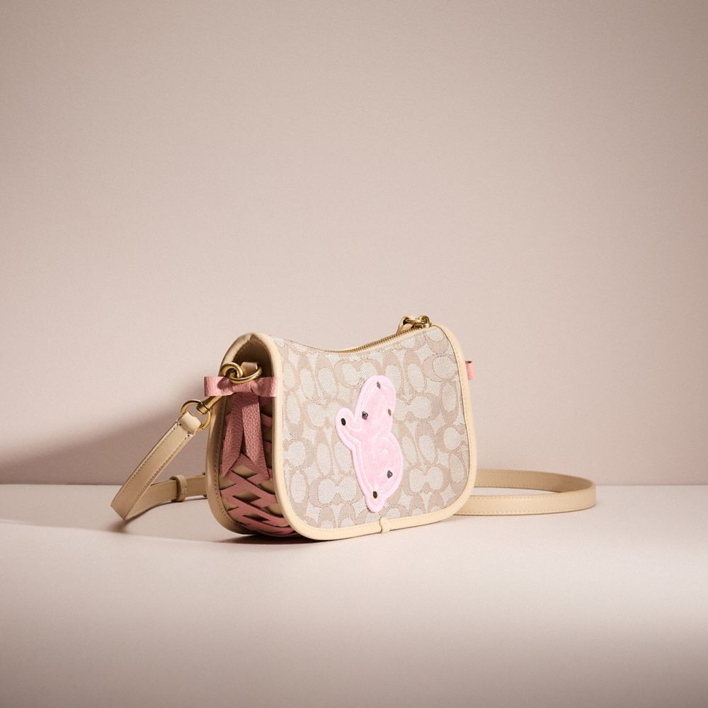 COACH®,UPCRAFTED SWINGER BAG IN SIGNATURE JACQUARD,Sweet Nostalgia,Brass/Stone Ivory,Angle View