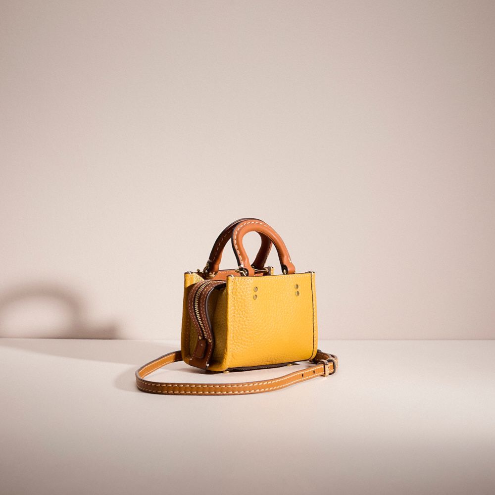 COACH®,Upcrafted Rogue 12 In Colorblock Regenerative Leather,Yellow,Angle View