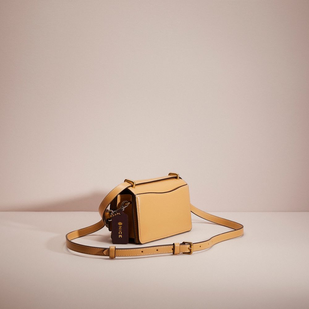 COACH®,UPCRAFTED BANDIT CROSSBODY,Sweet Nostalgia,Brass/Tan,Angle View