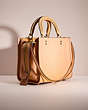 COACH®,UPCRAFTED ROGUE 25 IN ORIGINAL NATURAL LEATHER,Brass/Turmeric Root,Angle View
