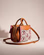 COACH®,UPCRAFTED ROGUE BAG 17 IN SIGNATURE TEXTILE JACQUARD WITH HEART EMBROIDERY,Brass/Cocoa Burnished Amber,Angle View