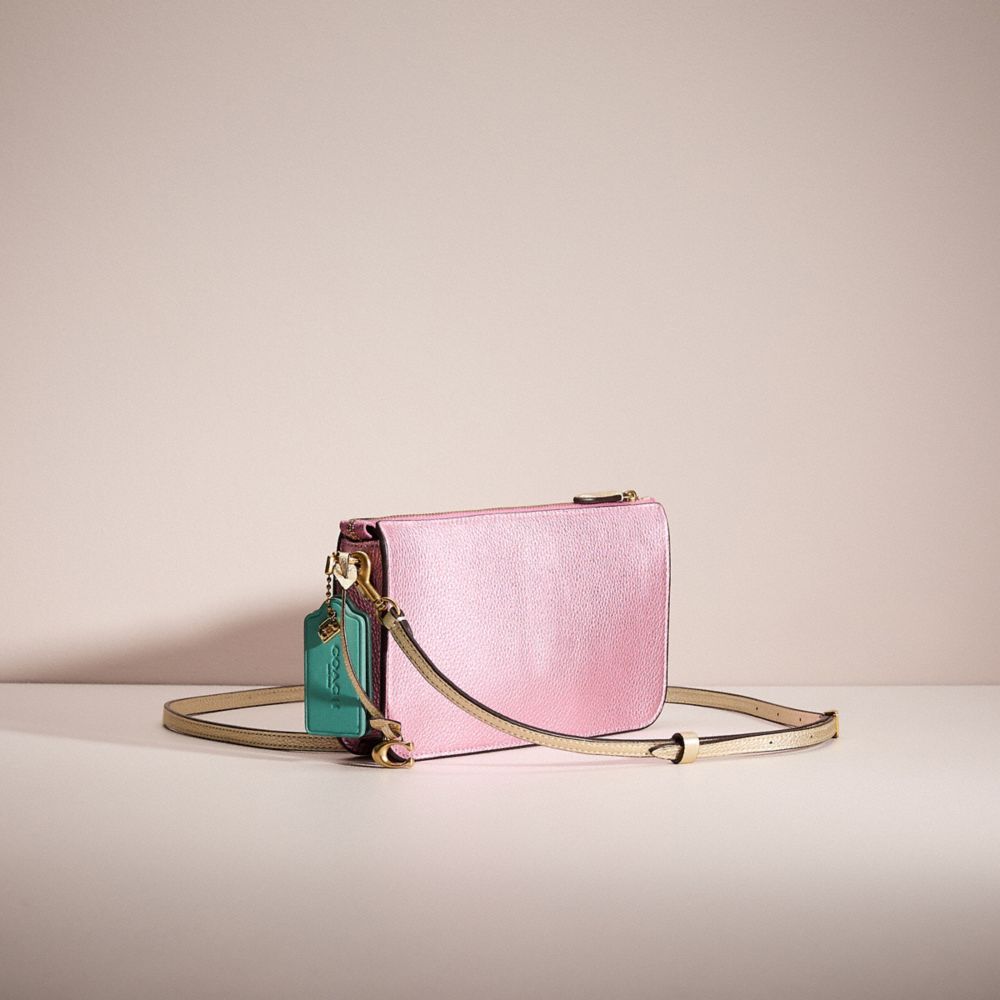 COACH®,UPCRAFTED NOA POP-UP MESSENGER IN COLORBLOCK,Brass/Metallic Pink Multi,Angle View