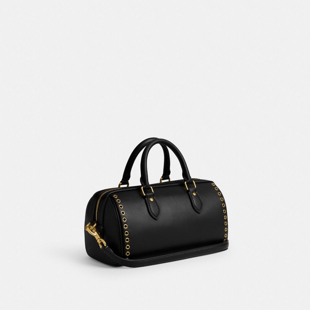 COACH®,Rowan Long Satchel Bag With Grommets,Leather,Barrel Bag,Logo,Metal,Grommet,Adjustable,Work,Day Party,Black,Angle View