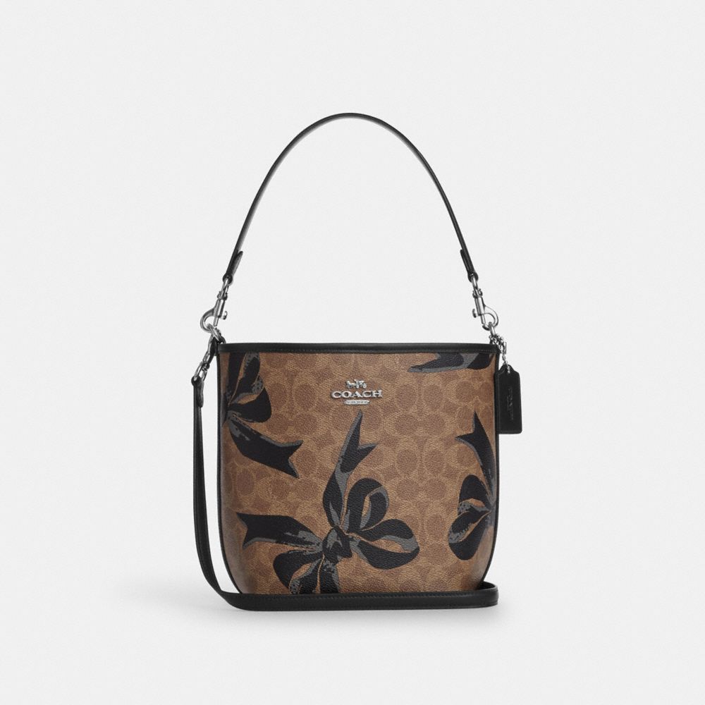 COACH®,City Bucket Bag In Signature Canvas With Bow Print,,Front View