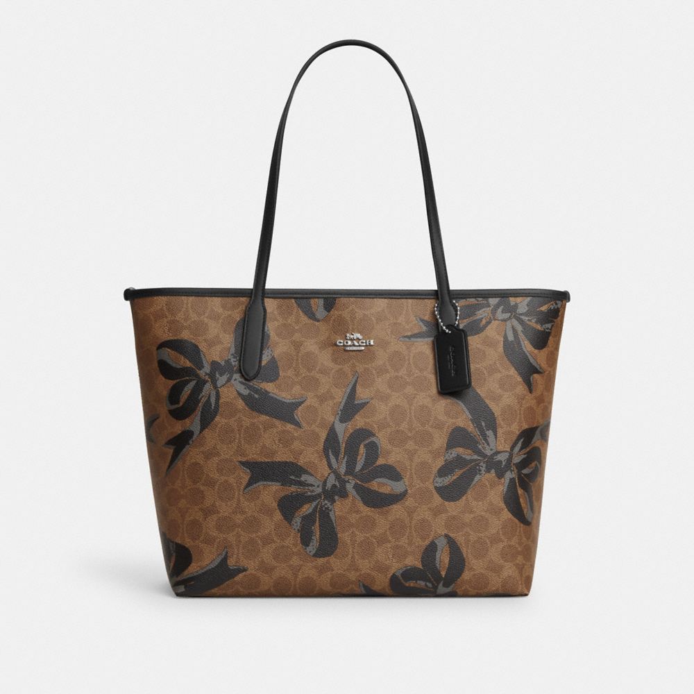 COACH Outlet City Tote Bag In Signature Canvas With Bow Print