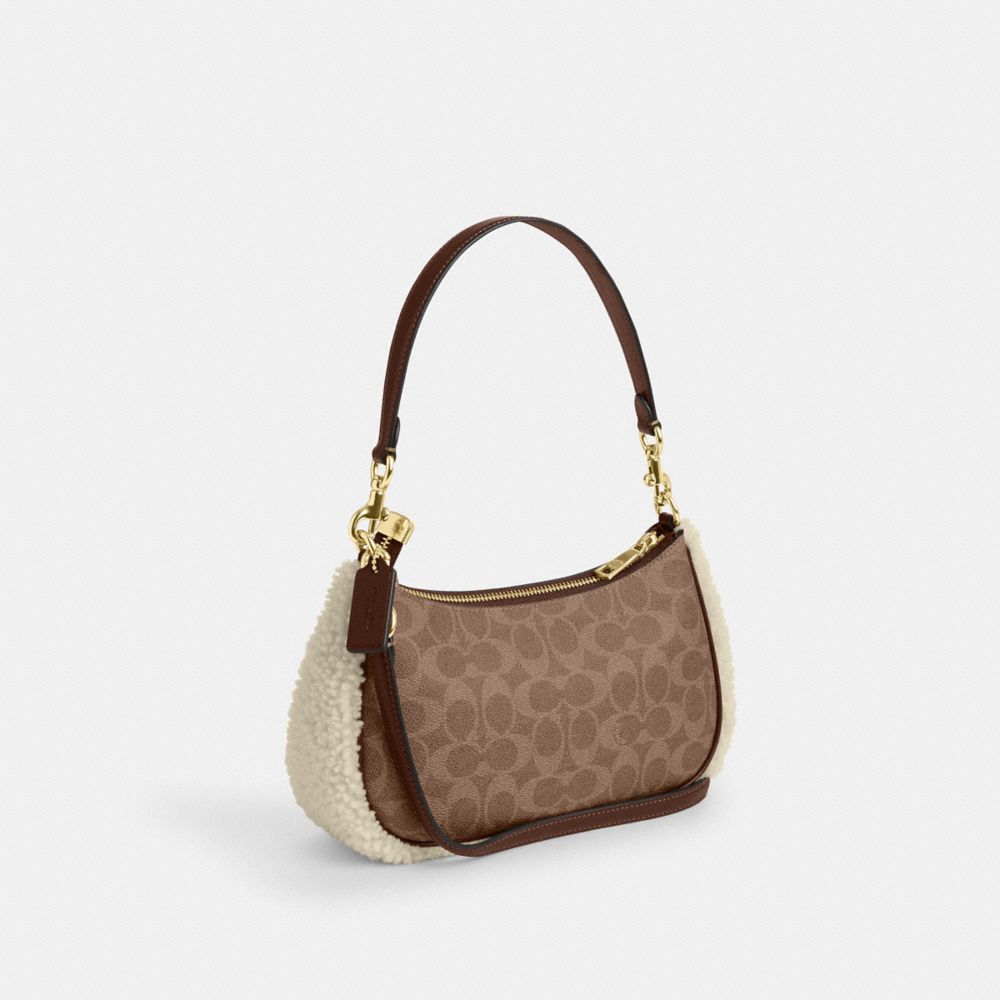 COACH®,Teri Shoulder Bag In Signature Canvas,,Angle View