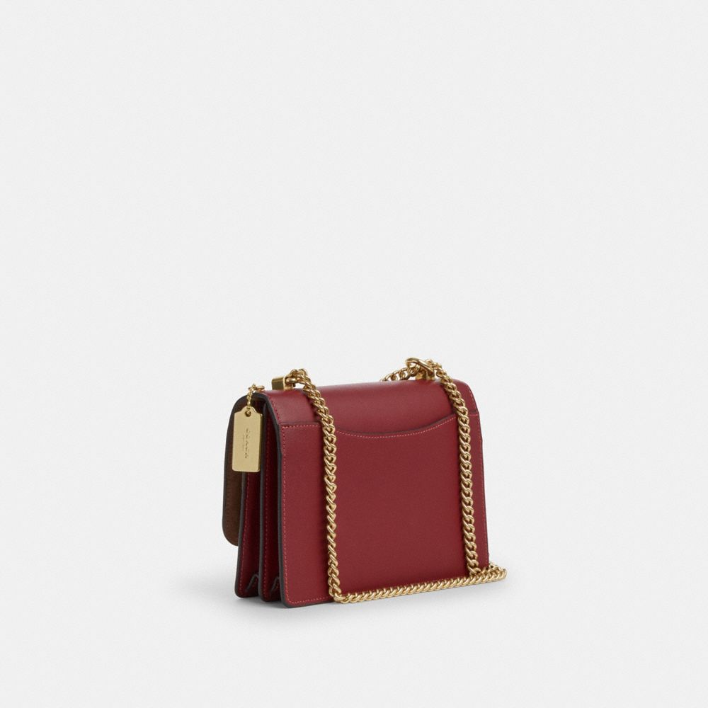 COACH®,Klare Crossbody Bag In Signature Canvas With Cherry Print,Leather,Canvas,Crossbody,Pattern,Adjustable,Day Party,Maroon,Angle View