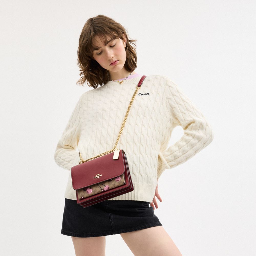 COACH®,Klare Crossbody Bag In Signature Canvas With Cherry Print,Leather,Canvas,Crossbody,Pattern,Adjustable,Day Party,Maroon,Detail View
