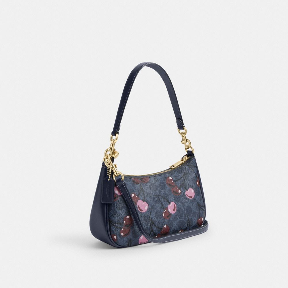 COACH®,Teri Shoulder Bag In Signature Canvas With Cherry Print,Canvas,Crossbody,Adjustable,Casual,Navy,Angle View