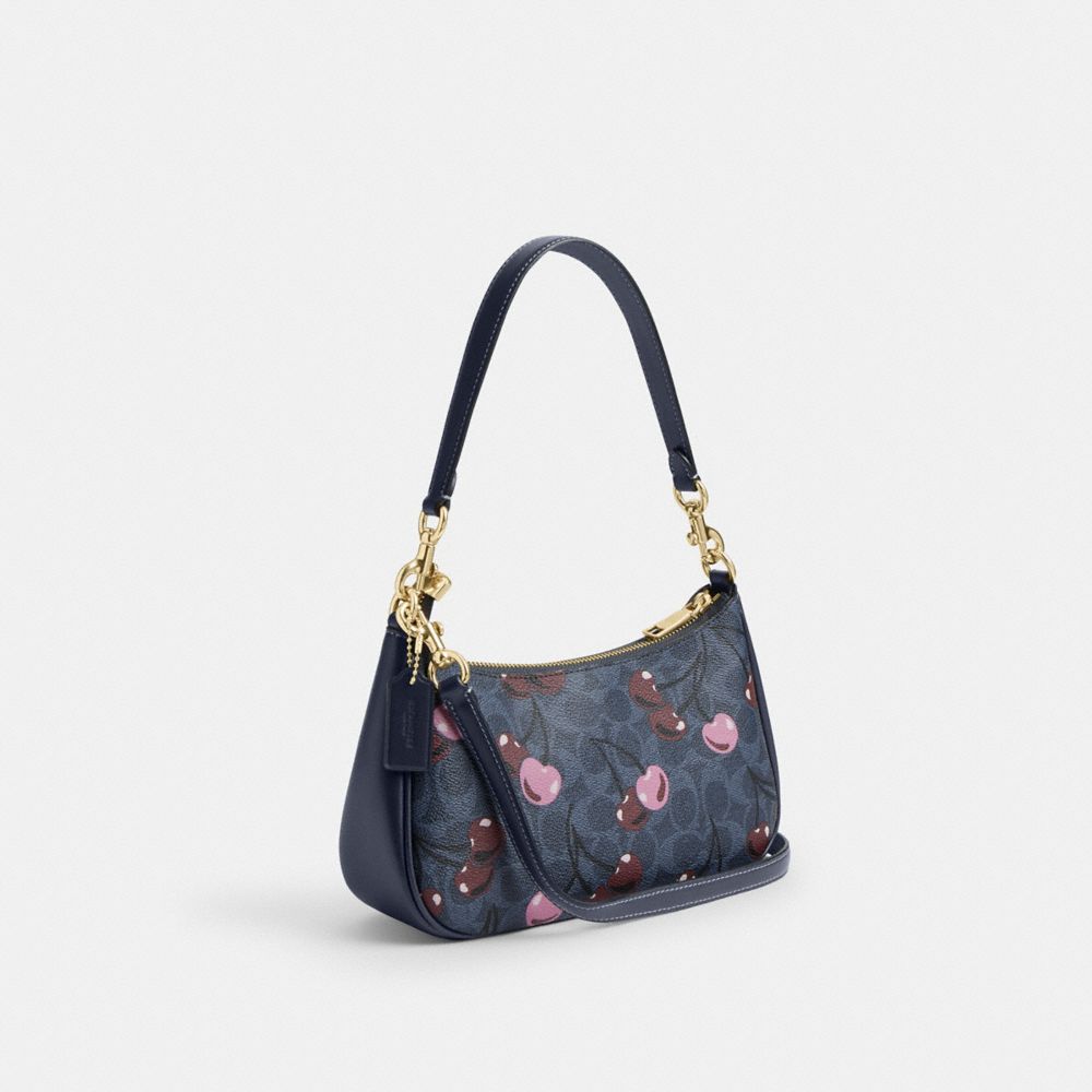 COACH®,Teri Shoulder Bag In Signature Canvas With Cherry Print,,Angle View