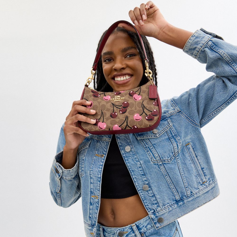 COACH®,Teri Shoulder Bag In Signature Canvas With Cherry Print,Canvas,Crossbody,Adjustable,Casual,Brown,Detail View