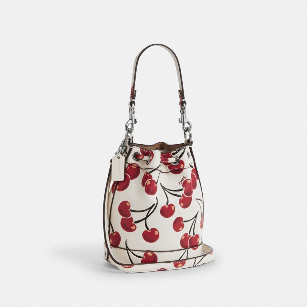 COACH®,Mini Bucket Bag With Cherry Print,Leather,Bucket,Logo,Metal,Word Embellishment,Day Party,White,Angle View