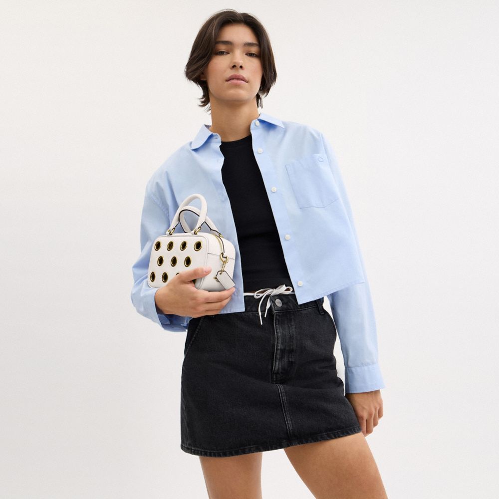 COACH®,Satchel Crossbody Bag With Grommets,Leather,Crossbody,Grommet,Metal,Embossed,Logo,Day Party,White,Detail View