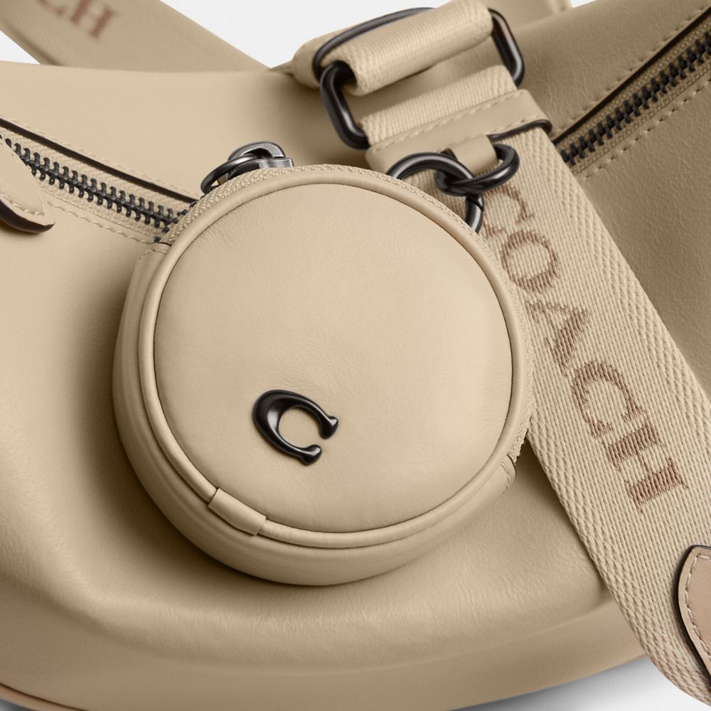 Coach Hall Soft Sling Bag In Ivory