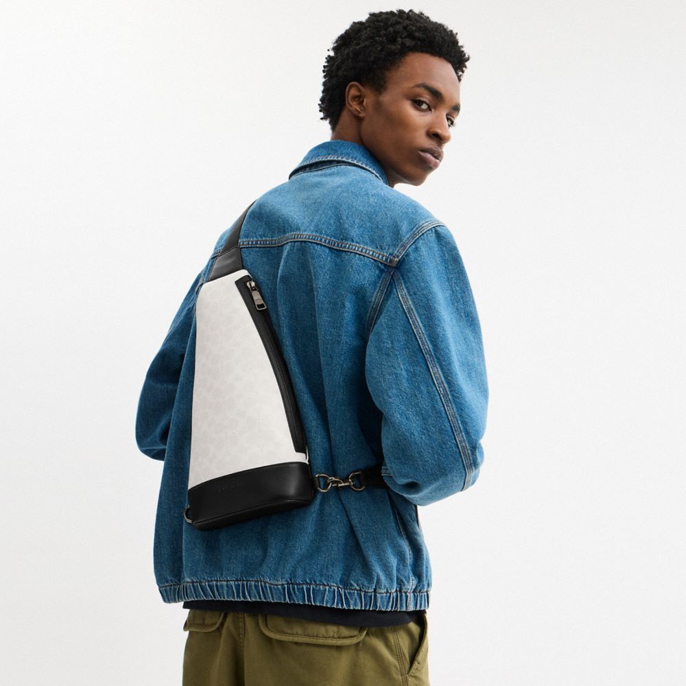 COACH®,Dominic Sling Pack In Signature Canvas,Canvas,Calfskin Leather,Slingback,Adjustable,Casual,,Detail View