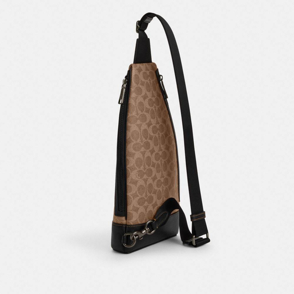 COACH®,Dominic Sling Pack In Signature Canvas,Canvas,Calfskin Leather,Slingback,Adjustable,Casual,Beige,Angle View