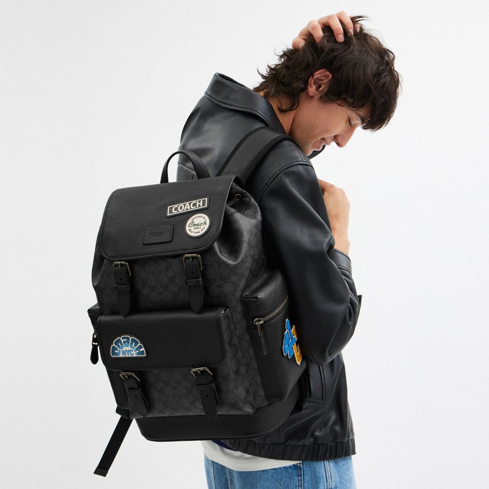 COACH®,Sprint Backpack In Signature Canvas With Patches,Canvas,Leather,Backpack,Applique,Casual,Black,Detail View