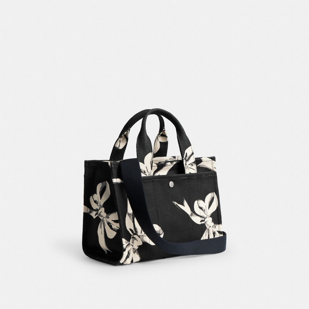 COACH®,Cargo Tote Bag 26 With Bow Print,Cotton,Crossbody,Sustainable,Silver Metal,Casual,Black,Angle View