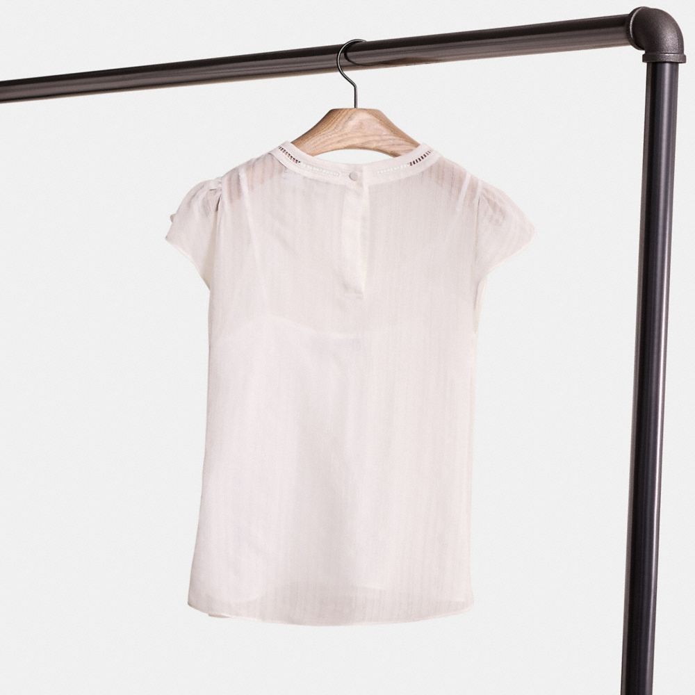 COACH®,RESTORED RUFFLE BLOUSE,Ivory,Back View