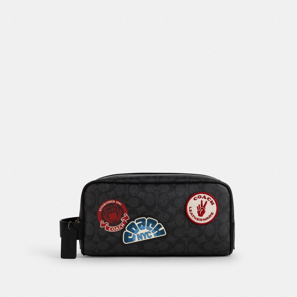 COACH®,Large Travel Kit In Signature Canvas With Patches,Black,Front View image number 0