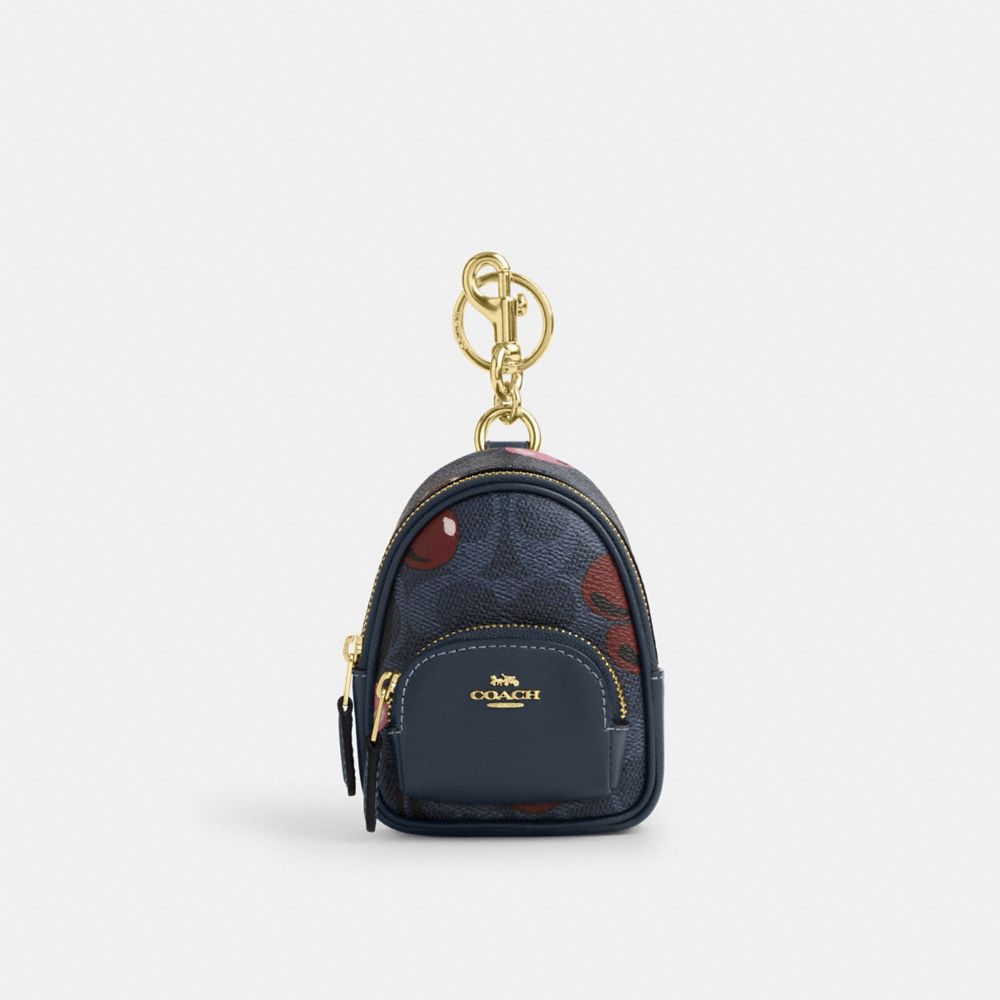 COACH®,Mini Court Backpack Bag Charm In Signature Canvas With Cherry Print,Black,Front View