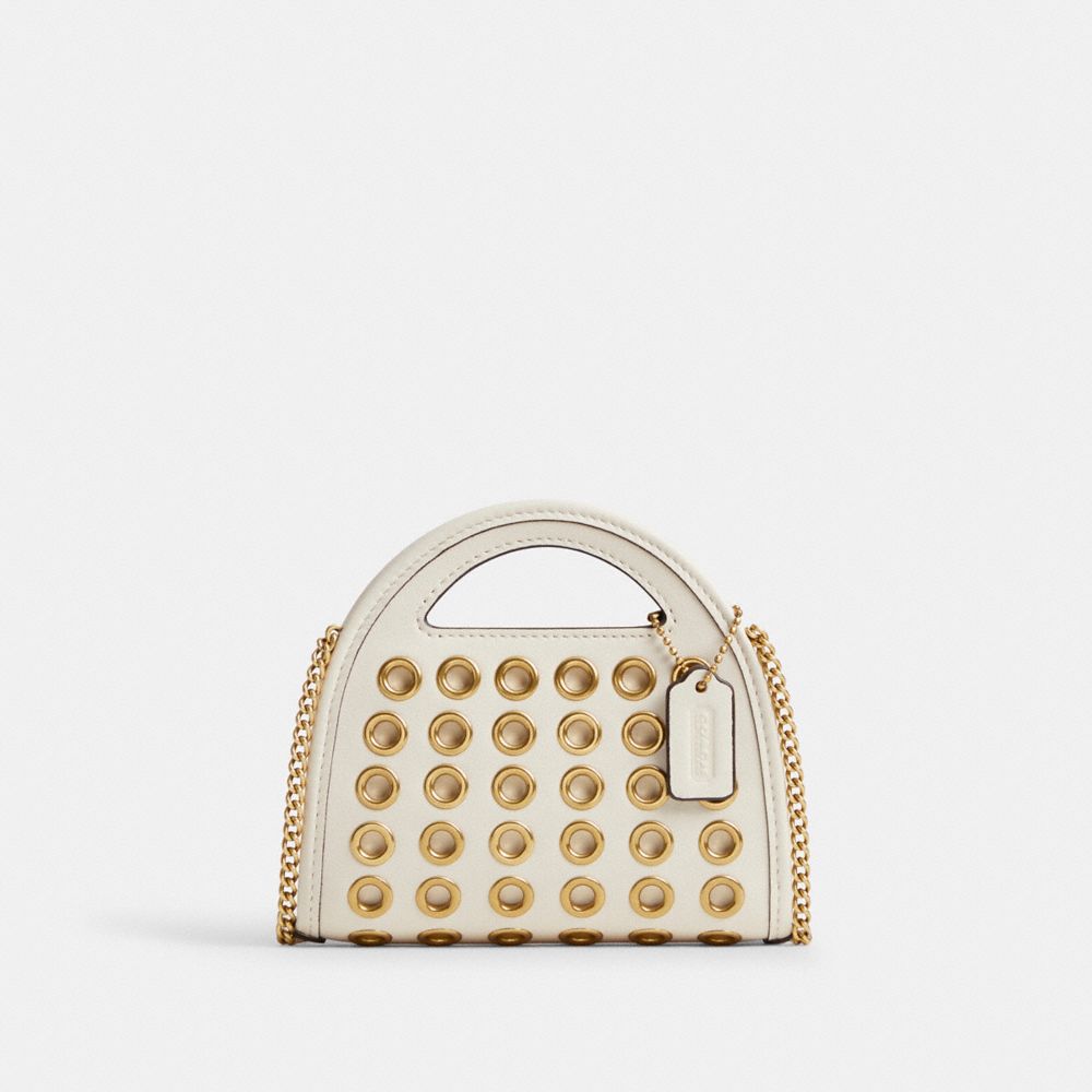 Shop Coach In Brass/chalk