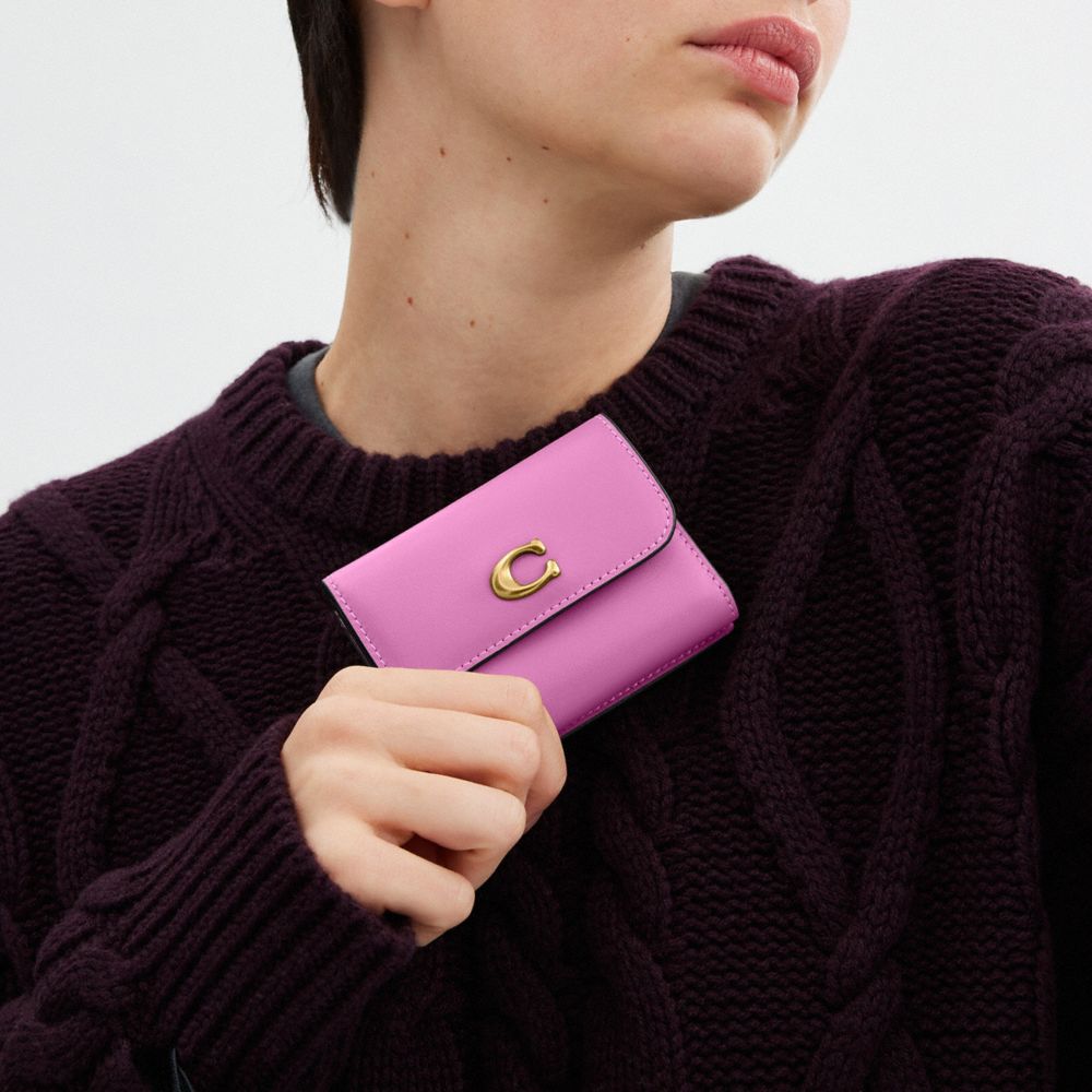 Coach In Brass/fuschia
