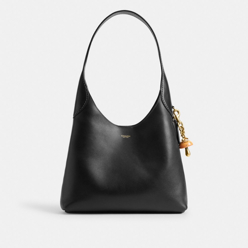 Shop Coach Taschenanhänger Pilz In Brass/mustard