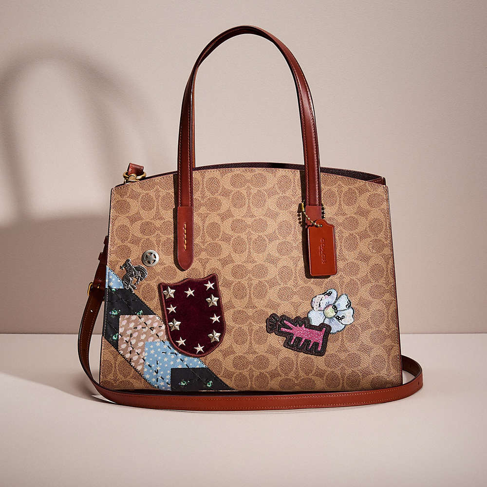 Coach Restored Charlie Carryall In Signature Patchwork In Brown
