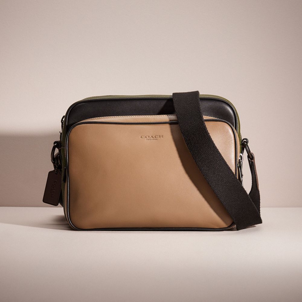 COACH®,RESTORED METROPOLITAN SOFT ZIP MESSENGER IN COLORBLOCK,Black Copper/Army Green Multi,Front View