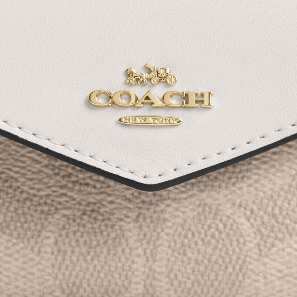 COACH®,Flap Card Case In Signature Canvas,