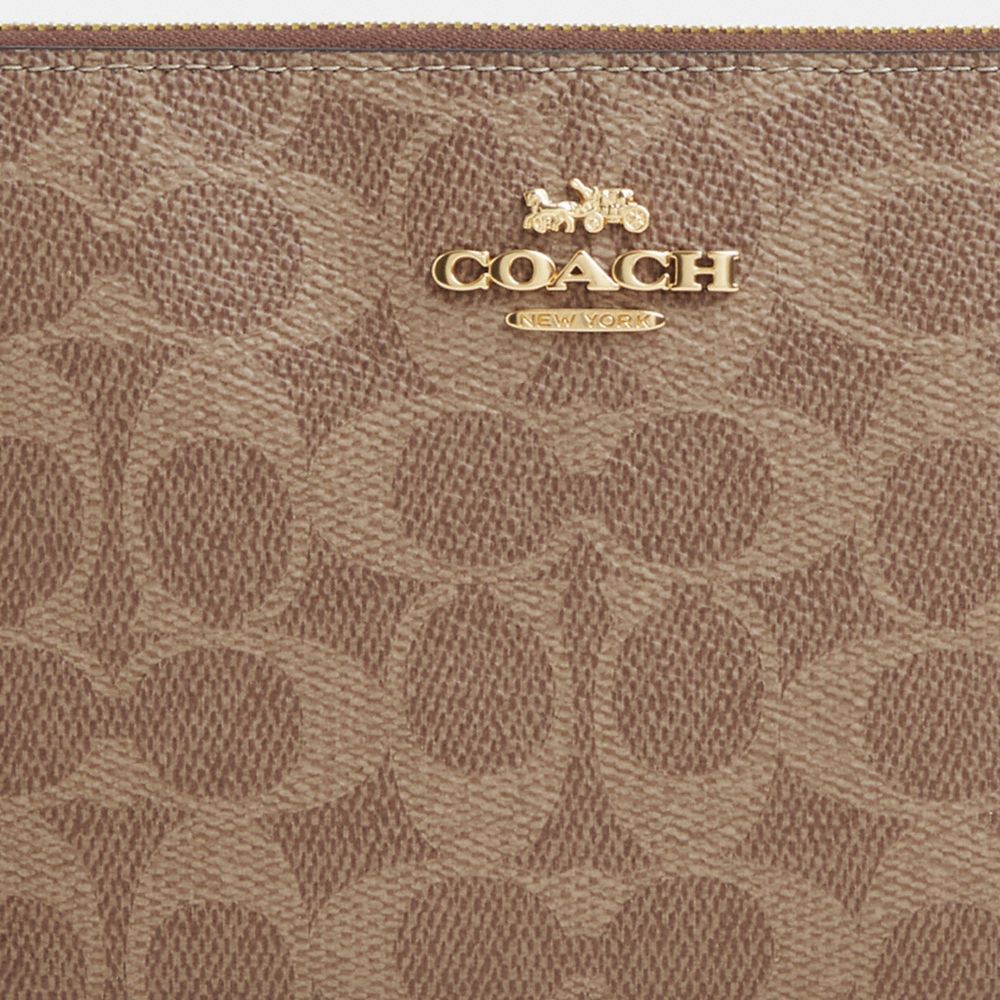 COACH®,Large Corner Zip Wristlet In Signature Canvas,