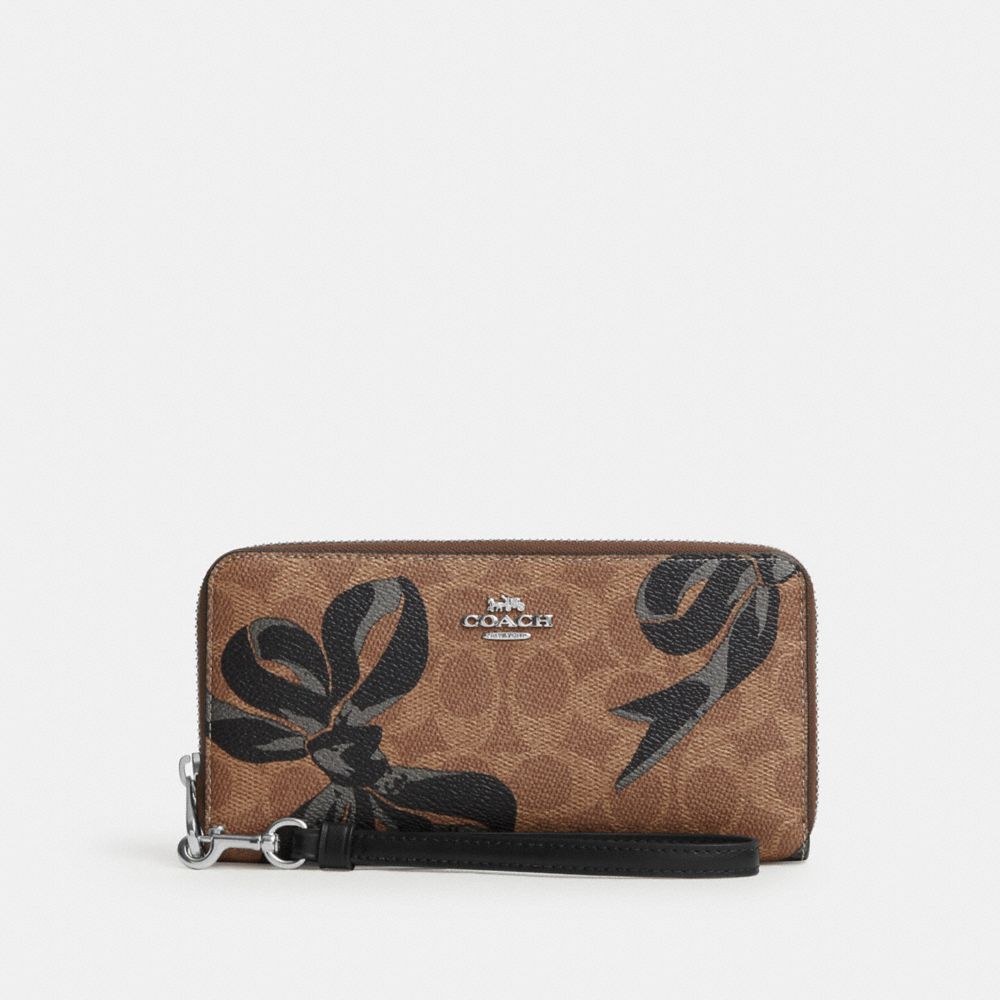 COACH®,Long Zip Around Wallet In Signature Canvas With Bow Print,,Front View