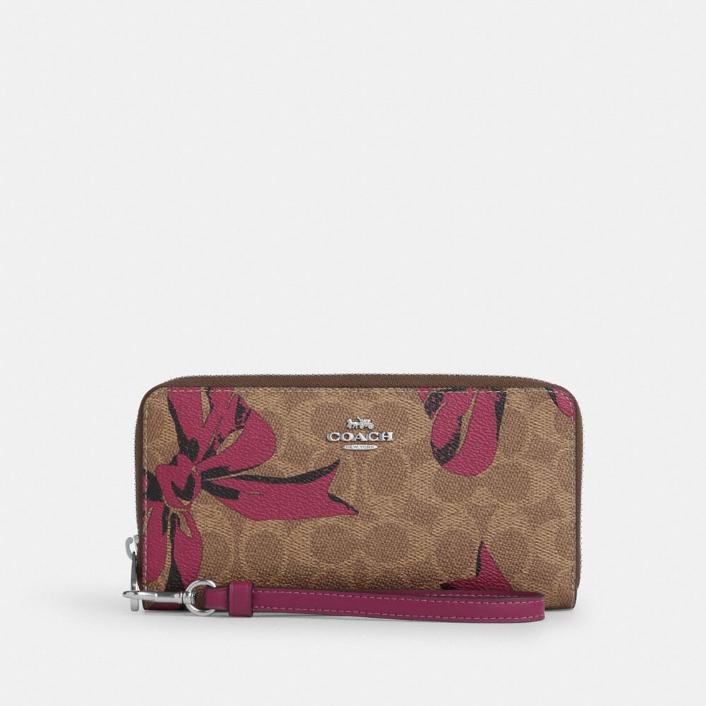 COACH®,Long Zip Around Wallet In Signature Canvas With Bow Print,,Front View