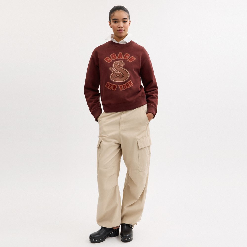 COACH®,New Year Crewneck Sweatshirt With Snake Graphic,,Scale View