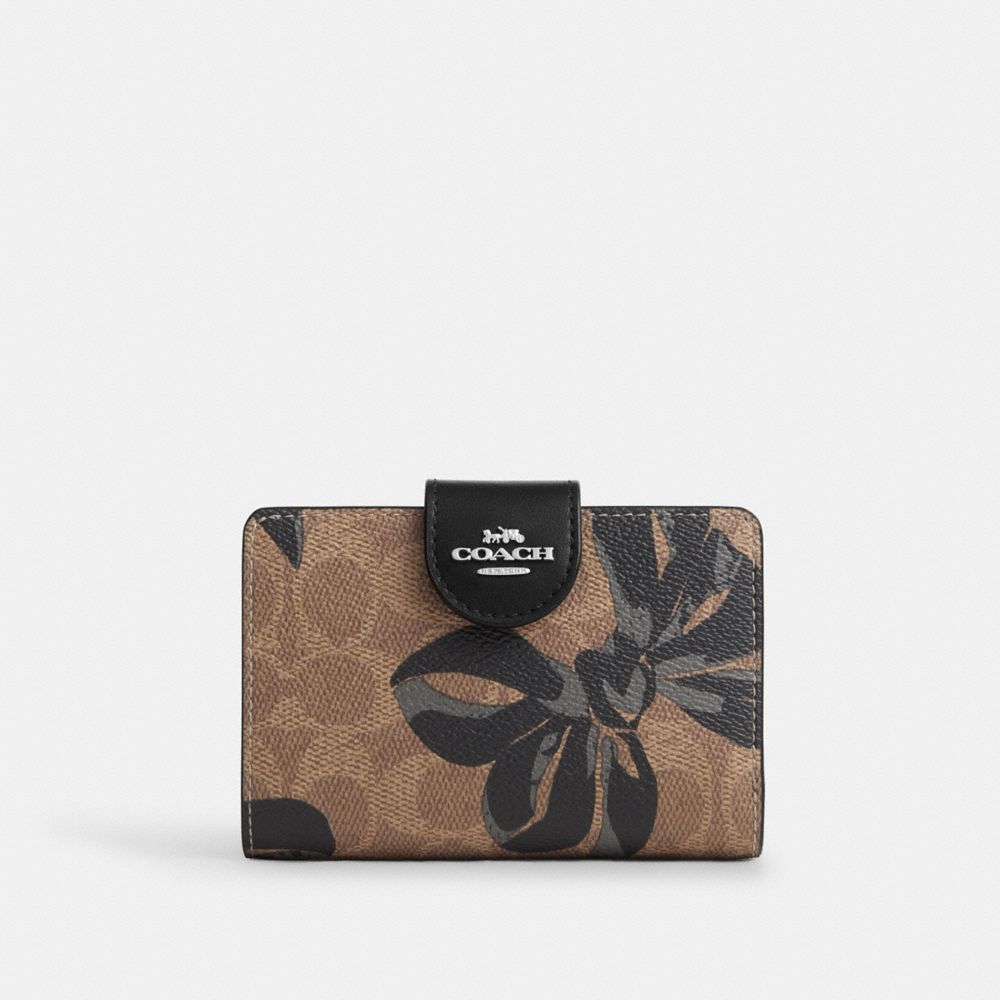 COACH®,Medium Corner Zip Wallet In Signature Canvas With Bow Print,,Front View