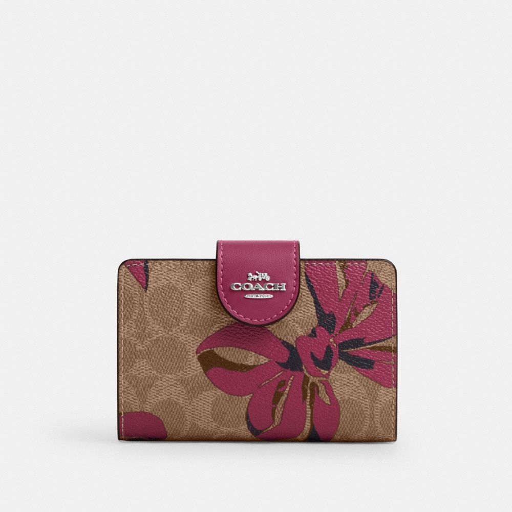 COACH®,Medium Corner Zip Wallet In Signature Canvas With Bow Print,,Front View