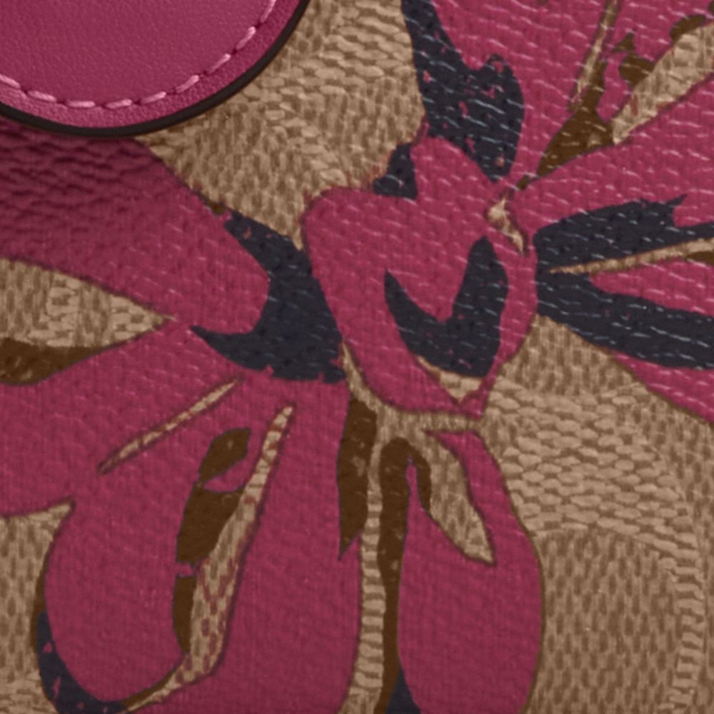 COACH®,Medium Corner Zip Wallet In Signature Canvas With Bow Print,