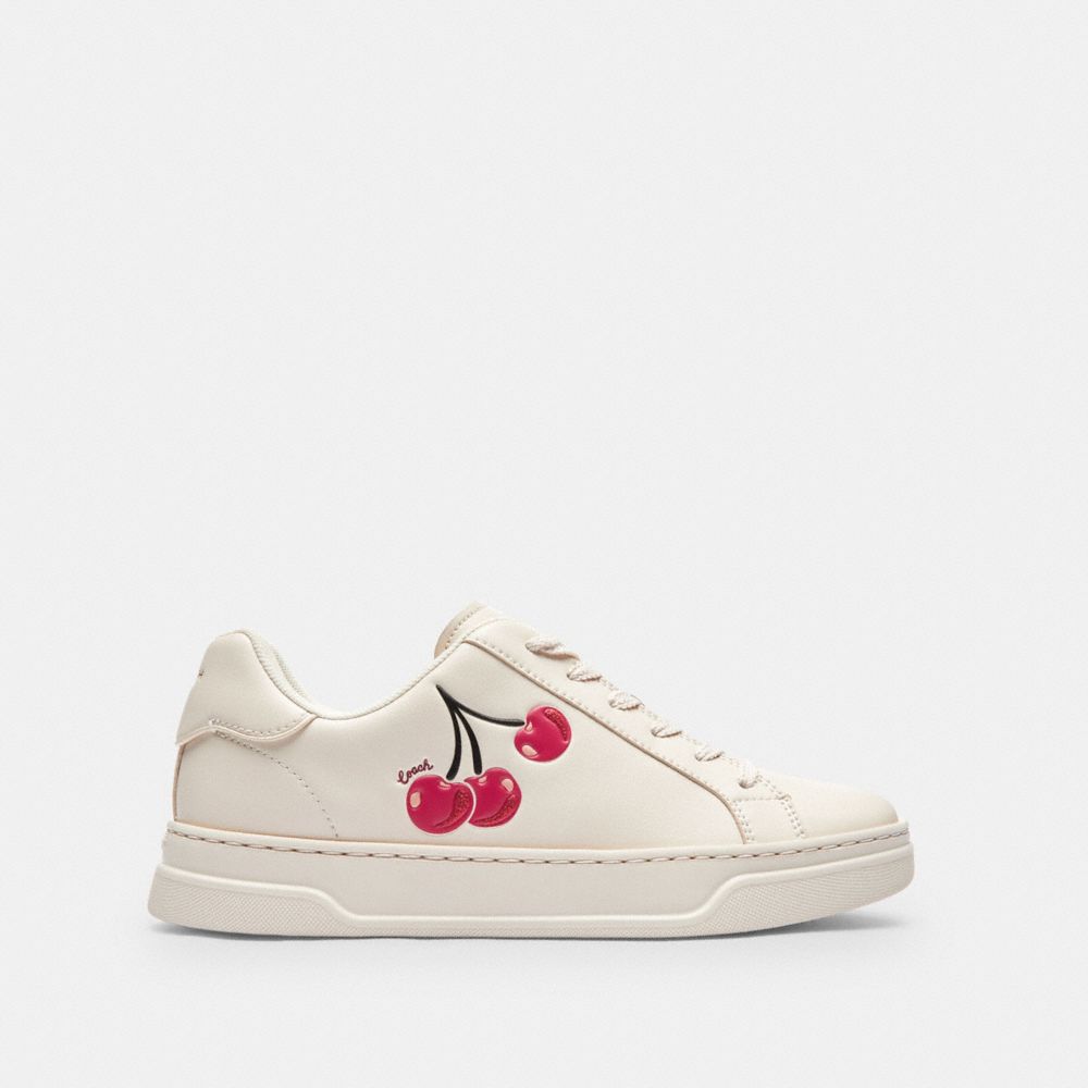 COACH®,High Line Sneaker With Cherry Print,,Angle View