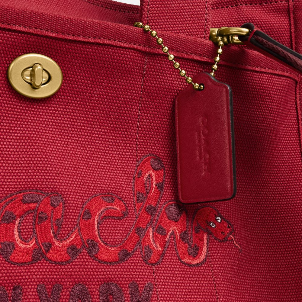 COACH®,New Year Cargo Tote Bag With Coach Snake Script,Cotton,Tote,Embroidered,Sustainable,Brass,Work,Casual,Maroon,Closer View