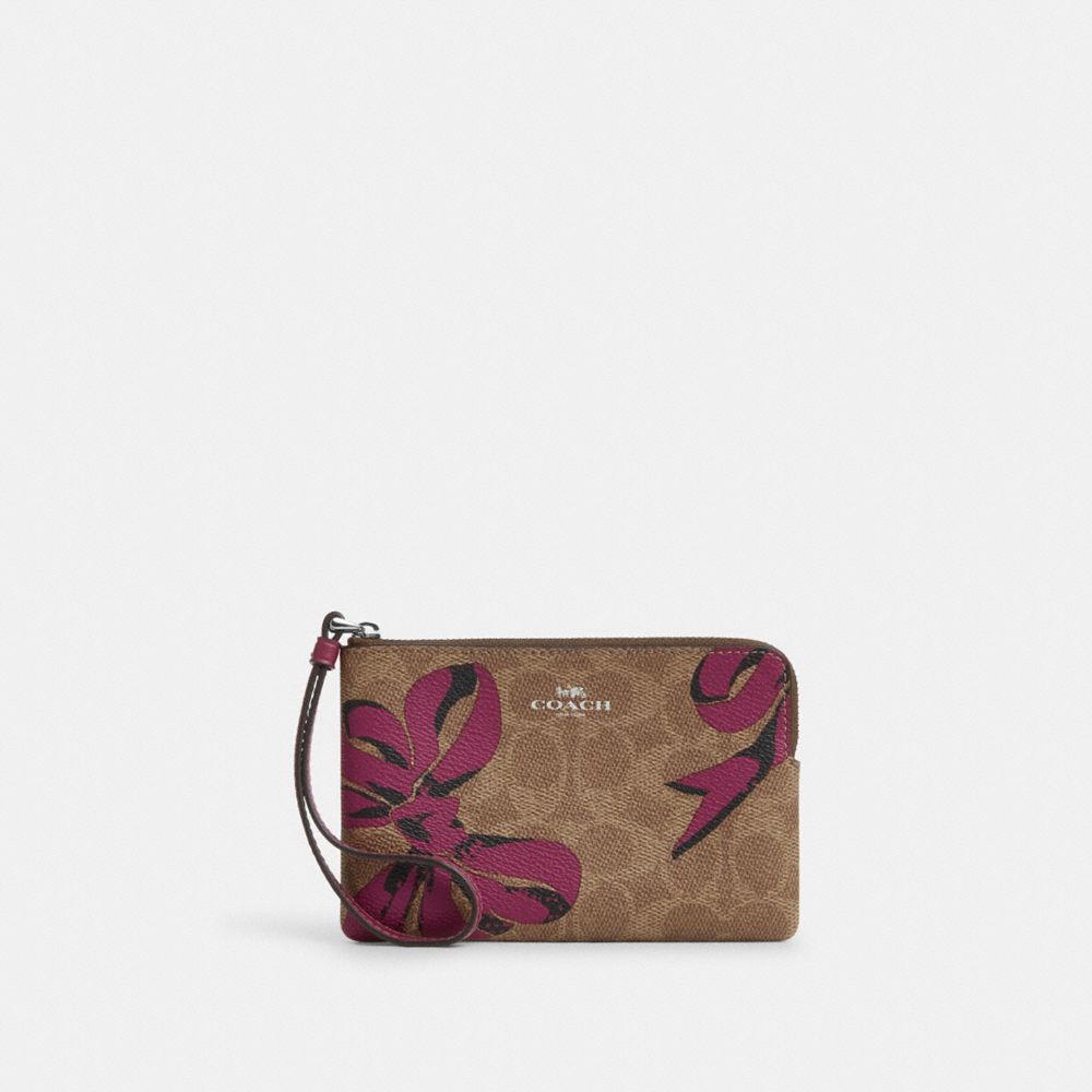 COACH®,Corner Zip Wristlet In Signature Canvas With Bow Print,,Front View