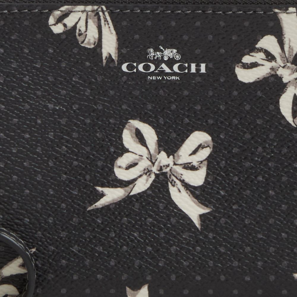 COACH®,Corner Zip Wristlet With Bow Print,