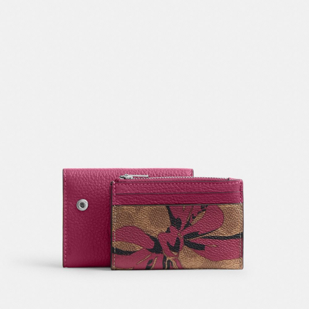 COACH®,Card Holder Wallet In Signature Canvas With Bow Print,,Angle View